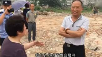 干部笑對(duì)拆遷戶 干部笑對(duì)拆遷戶