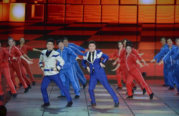 《小蘋果》、《最炫民族風(fēng)》等廣場舞曲將會有全國統(tǒng)一、編排科學(xué)、帶給人正能量的全新動作。 CFP 資料