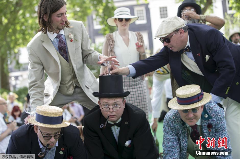 倫敦紳士運(yùn)動(dòng)會(huì) 騎車(chē)“擊傘”人仰馬翻